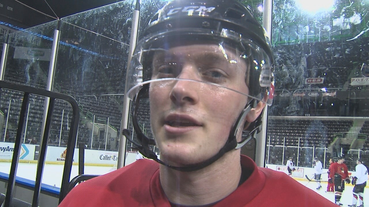 Injured hockey player Matt Olson returns to Minnesota