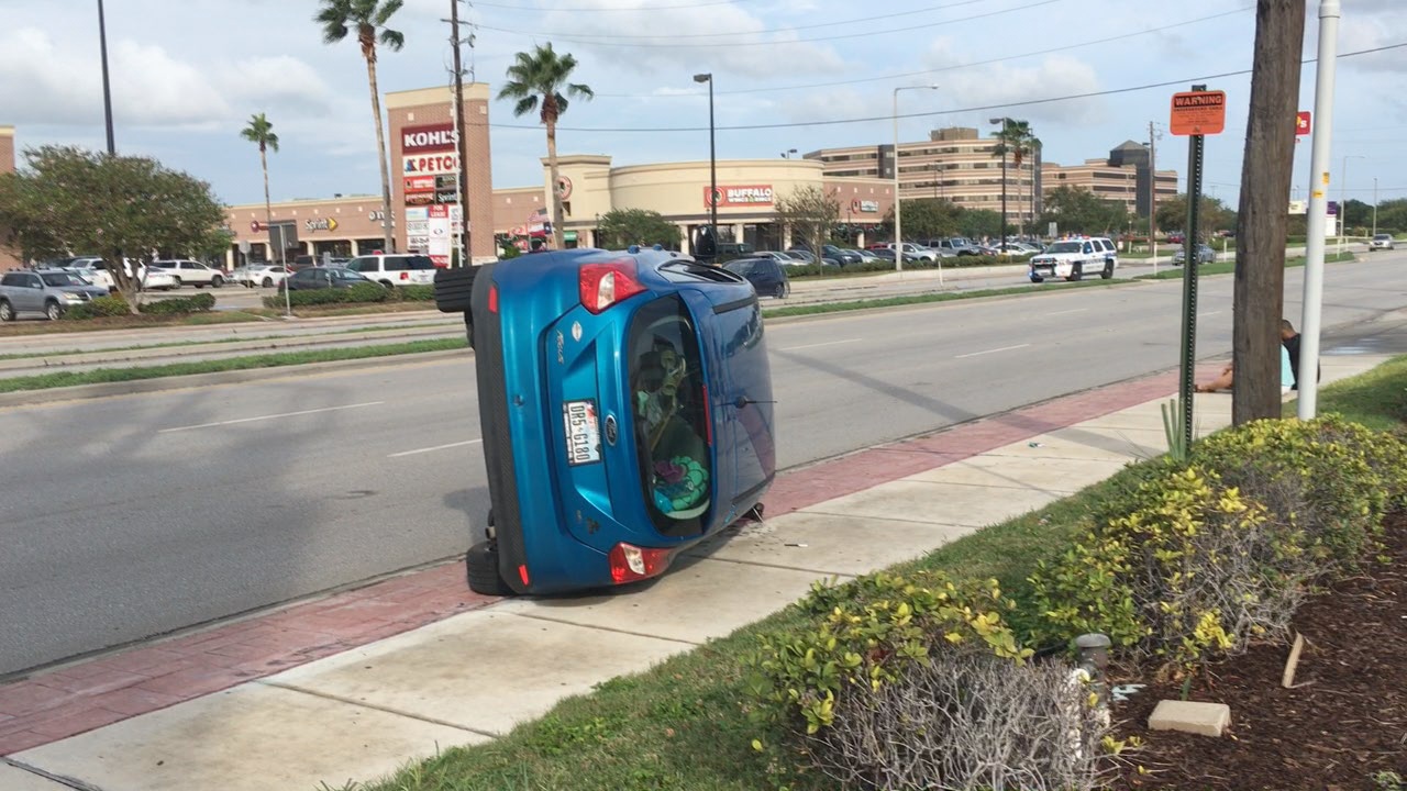 Driver and passenger walk away with no injuries after rollover accident ...